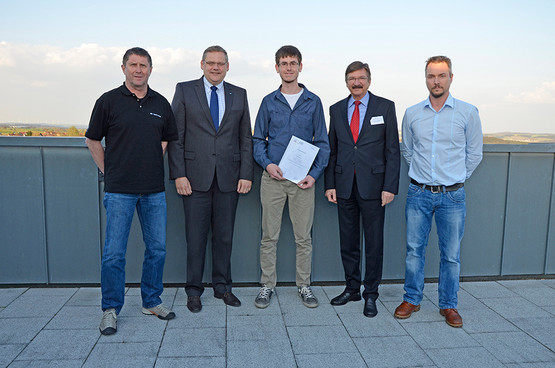 Winner of the Fabi 2nd prize, Rainer Joas (centre) with the trainers Jürgen Schmidt (left) and Marco Brand (right) and Thomas Mühleck, CFO (second from left) and Human Resources Manager Günther Bartschat (second from right)